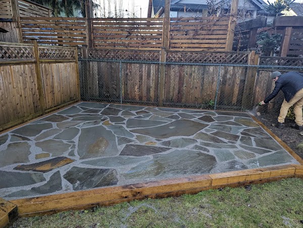 Flagstone patio being installed